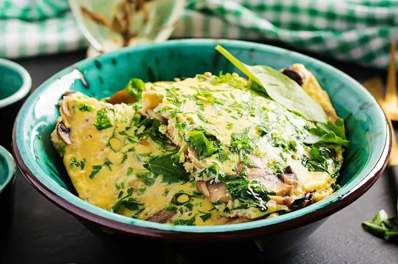 Omelette aux &eacute;pinards et champignons